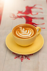 Close up white coffee cup with heart shape latte art,coffee latte in coffee shop cafe.