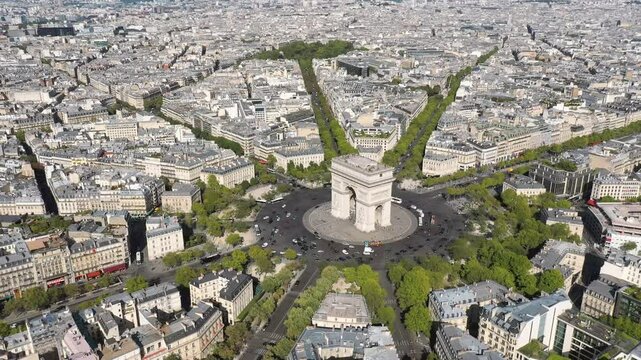 PARIS, FRANCE - OCTOBER 3, 2024: Aerial view of the Arc de Triomphe and the bustling streets surrounding it
