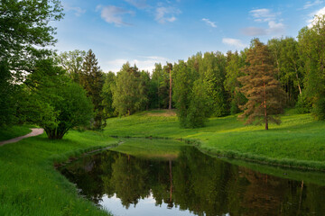 Slavyanka River Valley in the landscape part of the Pavlovsk Palace and Park Complex on a sunny...