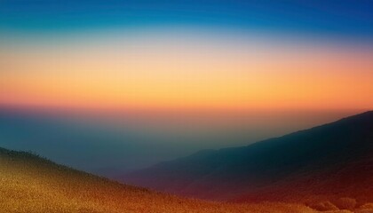 Obraz premium Serene Sunset Over the Misty Mountains 