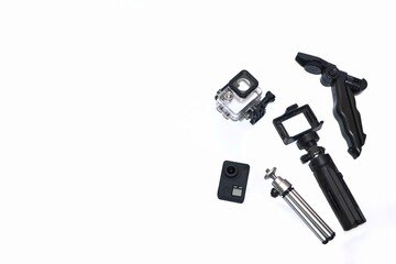 action camera with tripod accessory. isolated on white background