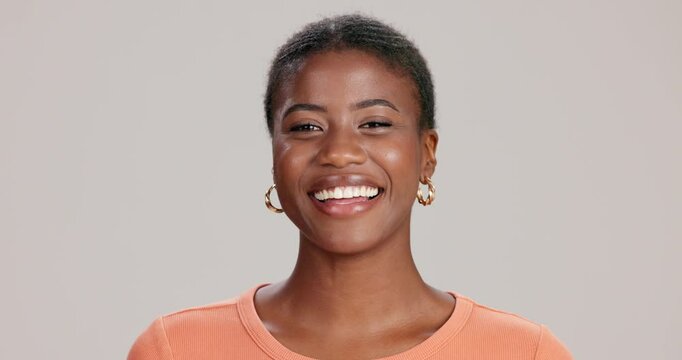 Face, black woman and happy in studio for fashion with satisfaction, pride and confidence in Kenya. Female person, isolated and smile on white background for casual wear, style and comfortable outfit