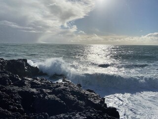 waves crashing on rocks