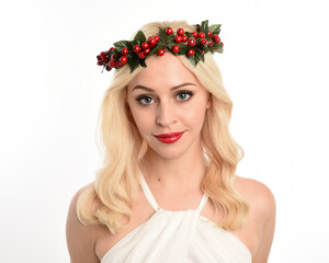 close up portrait of beautiful blonde female model wearing holly and ivy Christmas  fantasy wreath...