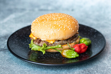 Beef Naga Burger served in dish plate isolated on grey background side view of Indian and Bangladeshi food