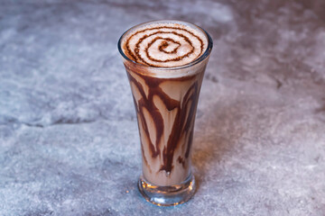Chocolate Shake served in glass isolated on grey background side view of Indian and Bangladeshi drink