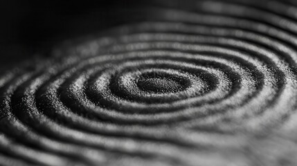 Naklejka premium Close-up image of concentric ripples in a textured surface, showcasing fluid dynamics.