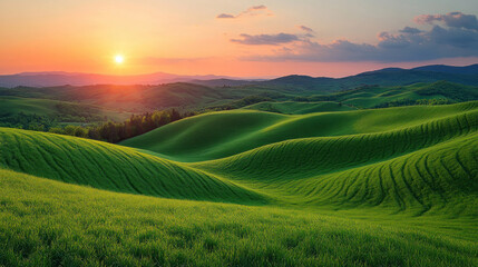 Obraz premium Nature background with rolling green hills under a vibrant sunrise