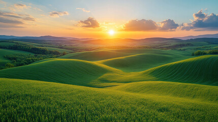 Obraz premium Nature background with rolling green hills under a vibrant sunrise