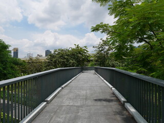 The path is made of cement.