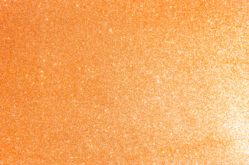 Abstract orange glitter texture background, shiny orange glitter background