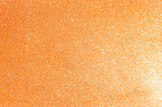 Fototapeta Abstract orange glitter texture background, shiny orange glitter background