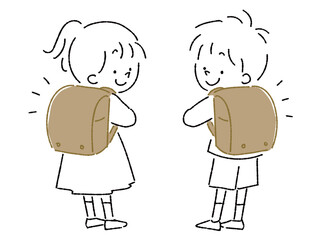 ランドセルを背負って振り向く後ろ姿の子供