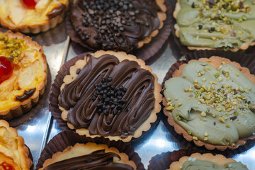 Chocolate and Pistachio Cream Decorated Tarts