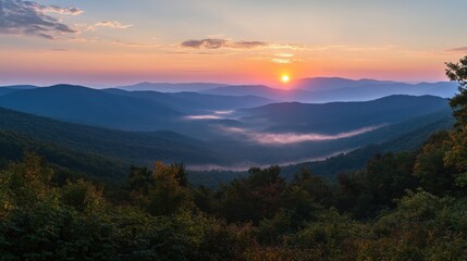 Fototapeta premium stunning mountain sunrise over misty valleys