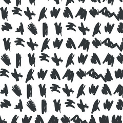 Small spots in the form of strokes or hatched formations