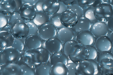 Blue water gel balls. Polymer gel. Silica gel. Balls of hydrogel round shape. Crystal liquid ball...