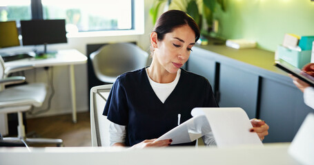 Clinic, receptionist and woman with paperwork for medical service, appointment and administration....