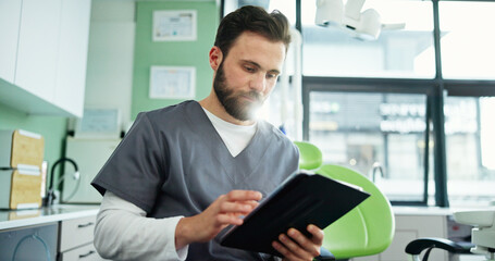 Online, dentist and man with tablet for medical service, appointment schedule and research....