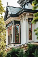 Obraz premium Victorian townhouse with bay windows and ornate detailing, showcasing historic charm