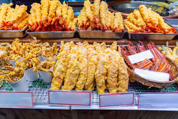 Deep fried shrimps prawns Tempura Japanese traditional seafood at food mardet in Osaka Japan.