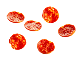 Pepperoni slices flying, isolated on transparent background.