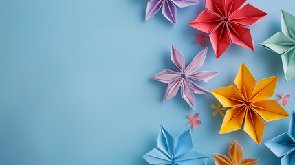  a colorful arrangement of origami flowers on a pastel-colored background, creating a cheerful and artistic display The paper flowers are in shades of yellow, pink, and light blue