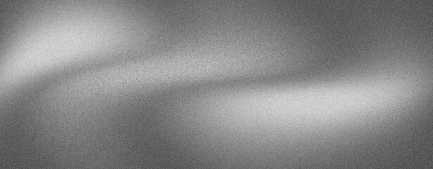 Abstract grayscale background with subtle light and shadow effects creating a smooth, metallic texture.
