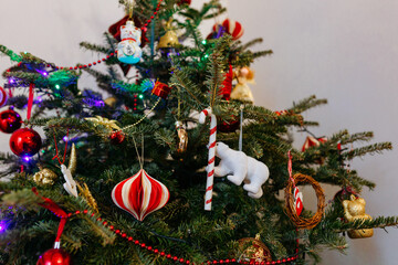christmas tree decorated with lights and various ornament