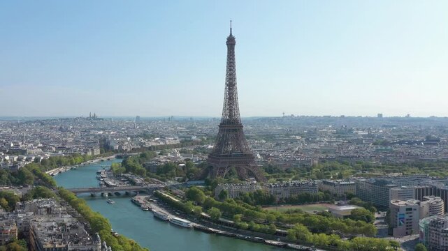 PARIS, FRANCE - OCTOBER 3, 2024: Stunning aerial view of Eiffel Tower surrounded by beautiful cityscape and river