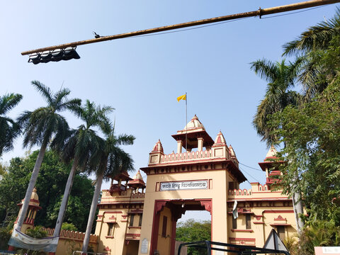 16 June 2023 Varanasi India. Entrance of Benaras Hindu University (BHU) in Varanasi with selective focus. Yellow gate of Asia's biggest University, situated in India.