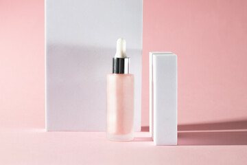 Pink glass dropper bottle with a silver cap at pink background with white geometric for, Modern and refined image for cosmetic promotion