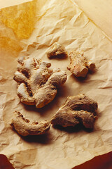 Indian spices, ginger zingiber officinale on brown paper, India