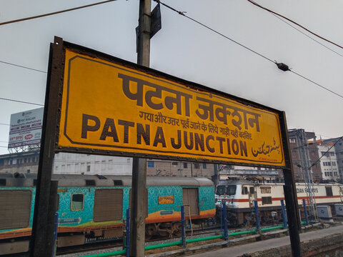 17 February 2023 Patna India. Patna junction sign board written in Hindi English and Urdu. a deserted railway station on a soft winter morning