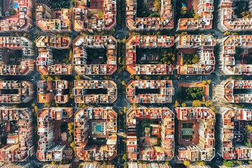 Obraz premium The overhead perspective reveals a bustling residential community with colorful buildings arranged in unique geometric layouts, reflecting urban design.