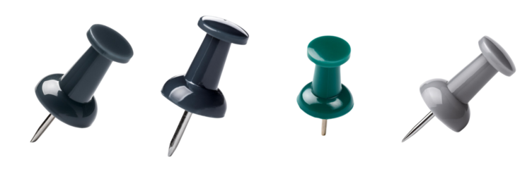 Collection of colorful push pins on a white isolated background.