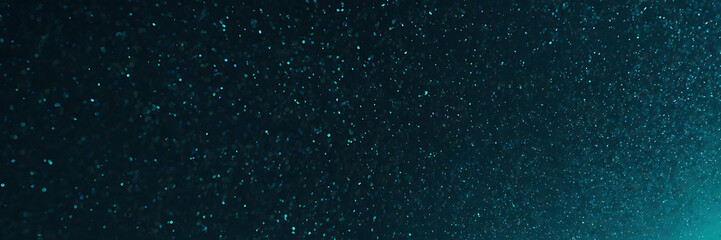 Obraz premium Cyan grainy banner background with a glowing noise texture effect, creating a bright and refreshing aesthetic for posters, headers, covers, and digital backdrops.