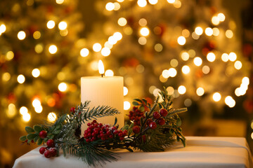 Cozy, magical atmosphere, Christmas tree on the background. Burning candles surrounded by bright garland lights