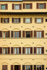 Yellow facade of a European apartment building
