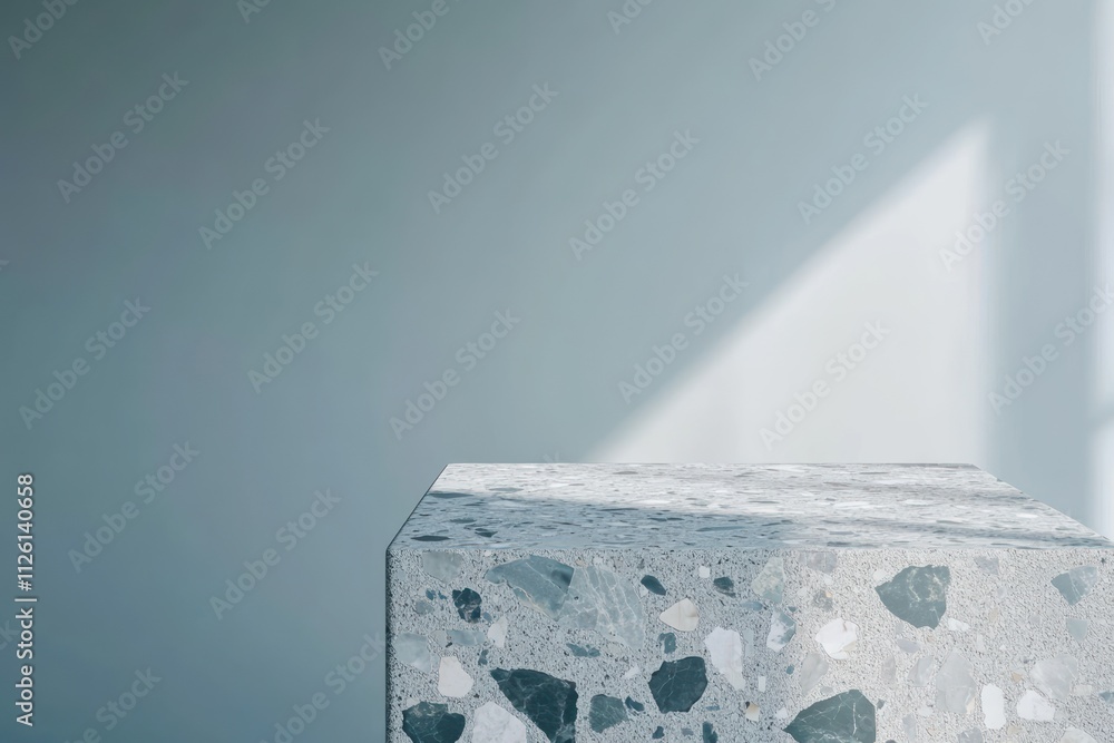 Poster A textured concrete block sits against a softly lit background, showcasing minimalist design.