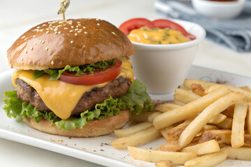 Meal of hamburger and french fries