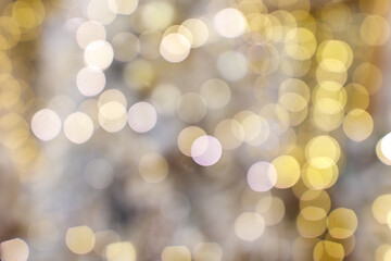 A blurry image of a bunch of golden circles