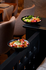 Tasty and juicy salads with sauces