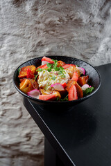 Tasty and juicy salads with sauces