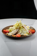 Tasty and juicy salads with sauces