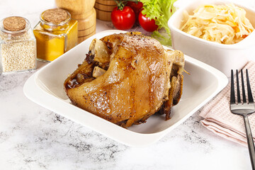 Baked pork knee with spices