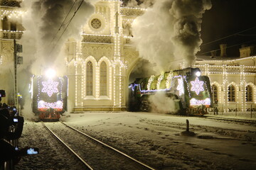 Christmas train with steam locomotive and illumination