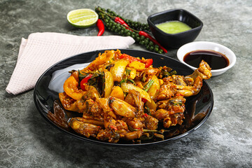 Vietnamese cuisine - fried frog with vegetables