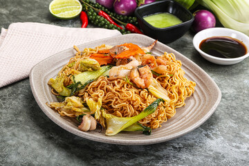 Asian cuisine - Fried noodles with seafood