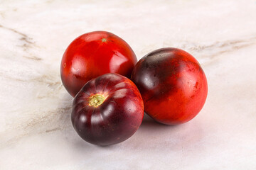 Black ripe juicy organic tomato